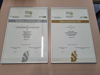 Photograph of a golden and a silver award to Arctur from Chamber of Commerce and Industry of Slovenia.