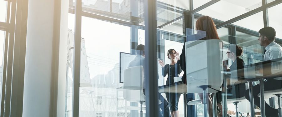 A meeting is being held by the employees.