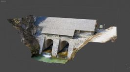 3D photograph of a stone bridge.