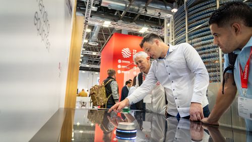 989719803233295_tp-food-group-at-iba-2025-dusseldorf-people-engaging-with-or-table.jpg