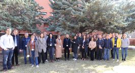 A group picture of twenty-eight participants at an event. 